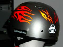 Orange reflective flame decals on half helmet